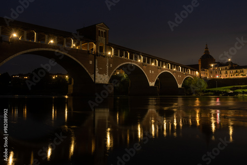 Obraz na płótnie Pavia Covered bridge night evening hamlet village country people characteristic w salonie