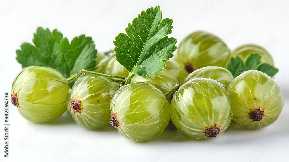 Fresh green gooseberries with leaves isolated on white background. Fresh green gooseberries with leaves isolated on white background.