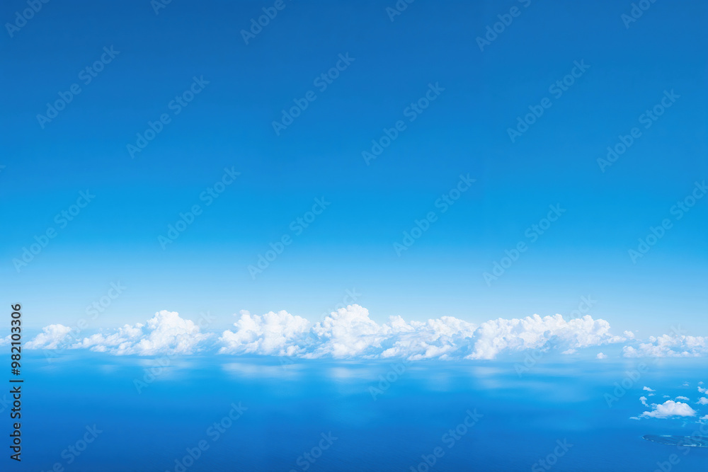 Obraz premium White clouds with deep blue sky and ocean