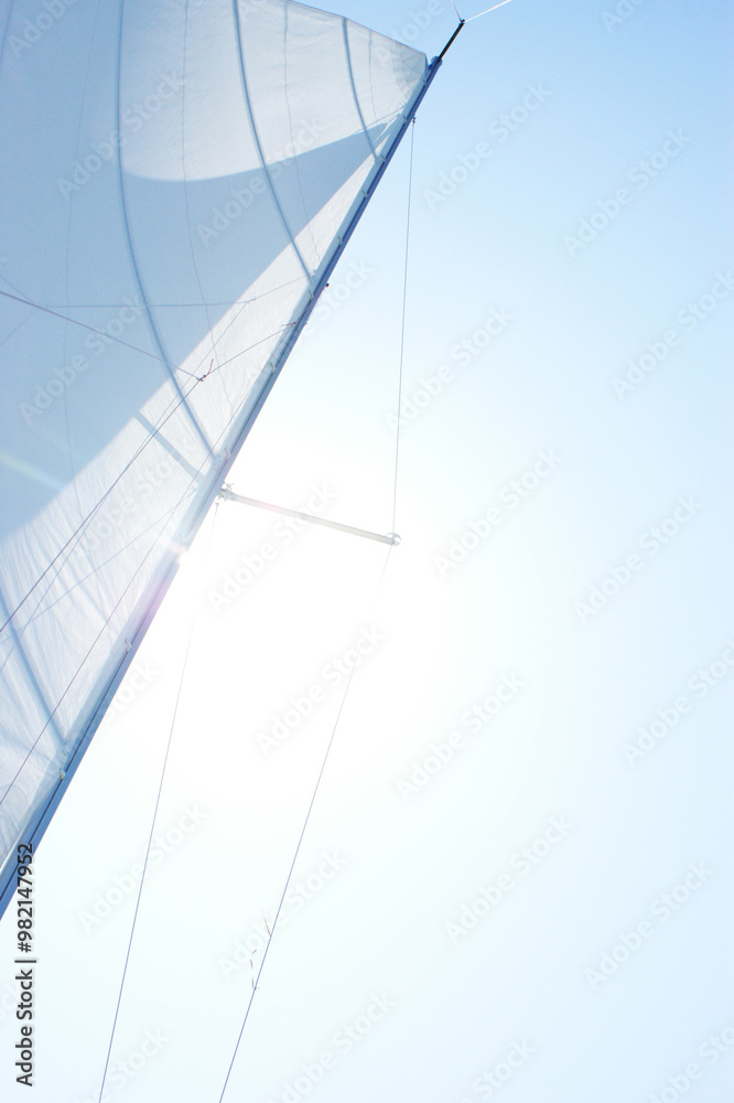 Fototapeta premium sail from a sailboat on a lake against the sky