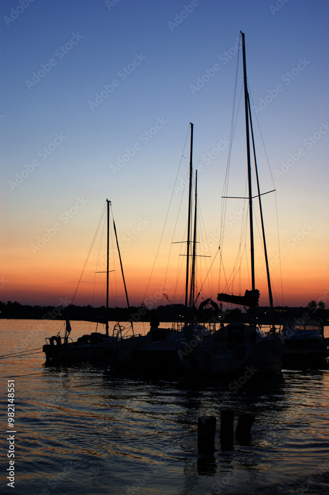 sunset sailing yacht sailboat moored to shore in port three masts sunset sailing yacht sailboat moored to shore in port three masts