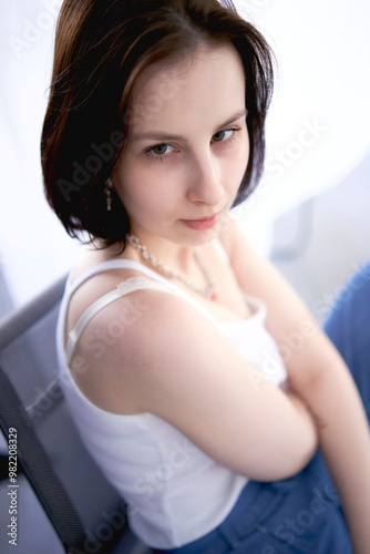 close up portrait of a young teenage girl fighting brain cancer at a studio photo shoot photo