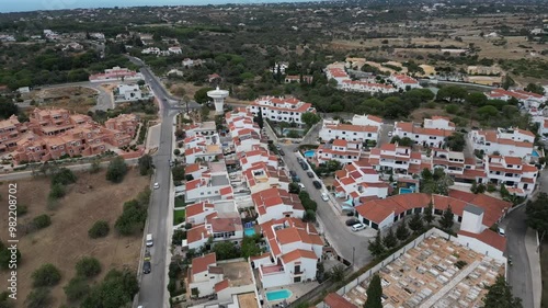 Middle high shot of Drone Aerial flying over Portugal Porches Village in Algarve photo