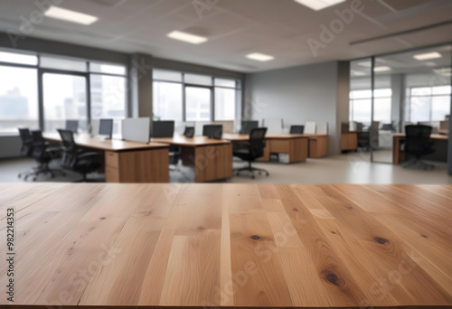 wooden table top with Blurred office background. modern office, meeting room. Silhouette, business people, business. lobby 