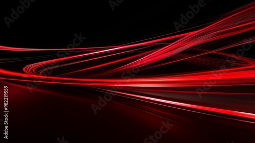 Abstract red lines depict the speed of the road in red. Red light trails on a dark background, with a high speed and fast motion blur effect. Design of a postcard, banner, website