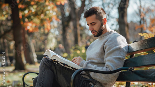 A man sitting on a park bench reading a self-help book, with a calm and reflective expression, symbolizing self-improvement and mental self-support.