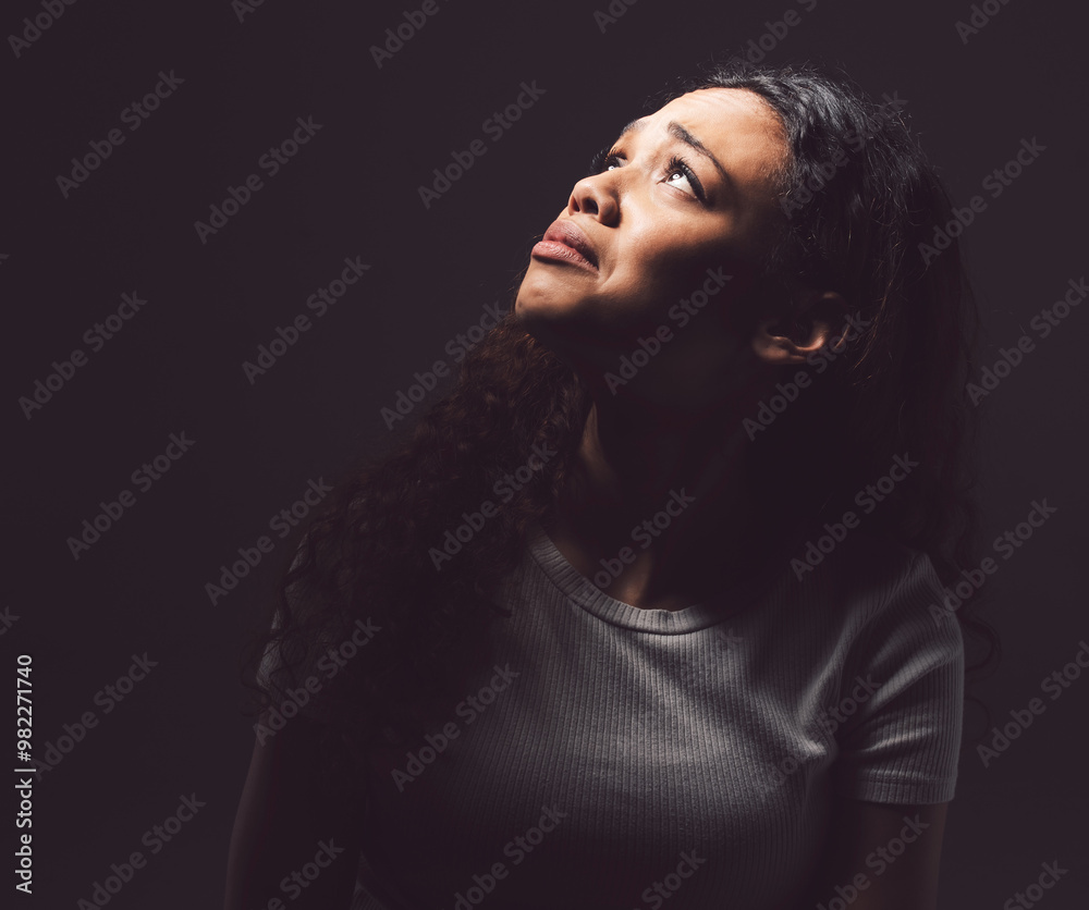 Woman, sad and depression in fear, anxiety and crying for mental health on dark background. Female person, bipolar and emotional as student for care, therapy and healing with grief, loss and disorder Woman, sad and depression in fear, anxiety and crying for mental health on dark background. Female person, bipolar and emotional as student for care, therapy and healing with grief, loss and disorder