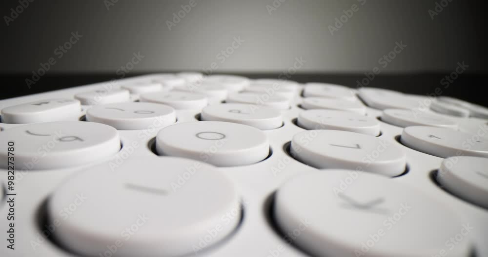 White modern stylish computer keyboard on black background. Choosing computer keyboard White modern stylish computer keyboard on black background. Choosing computer keyboard