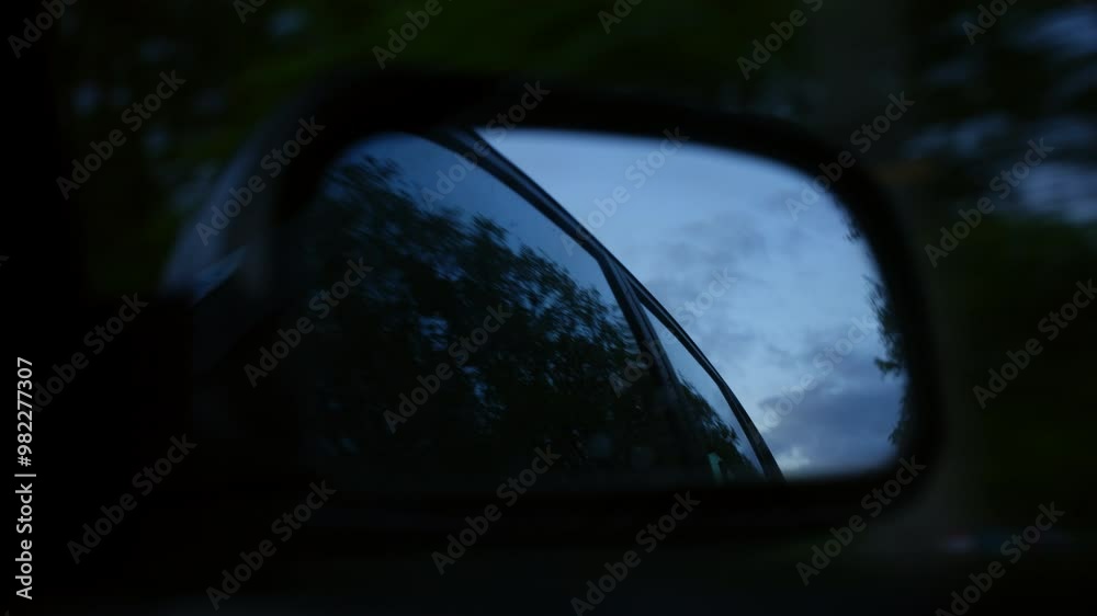 view at the sky through a car mirror. view at the sky through a car mirror.