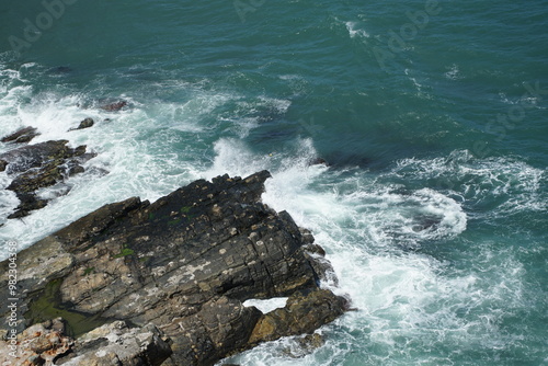 waves crashing on rocks