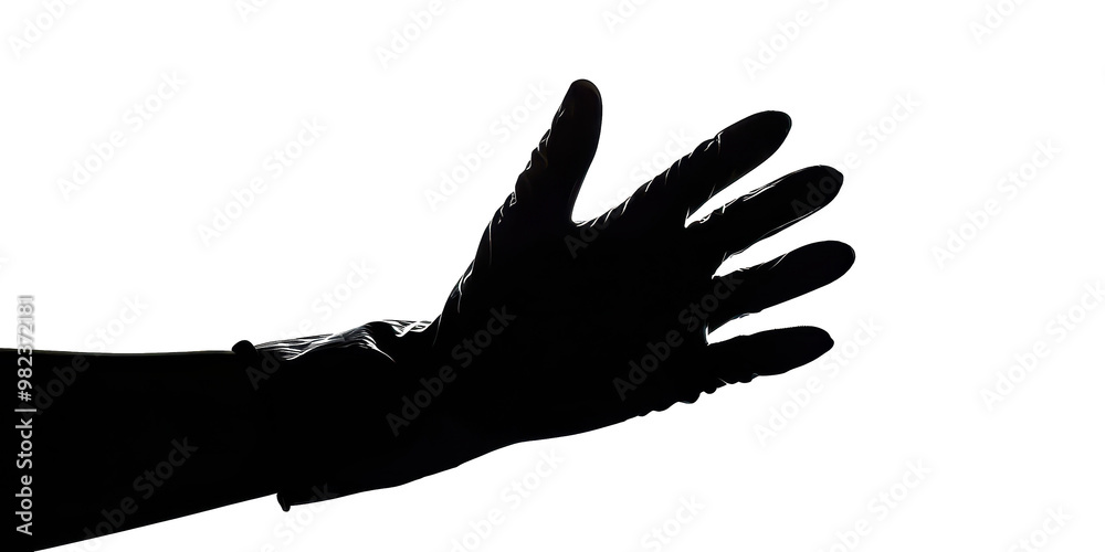 A hand with a glove on it is shown in a black and white photo