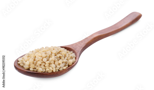 Raw couscous in wooden spoon isolated on white photo