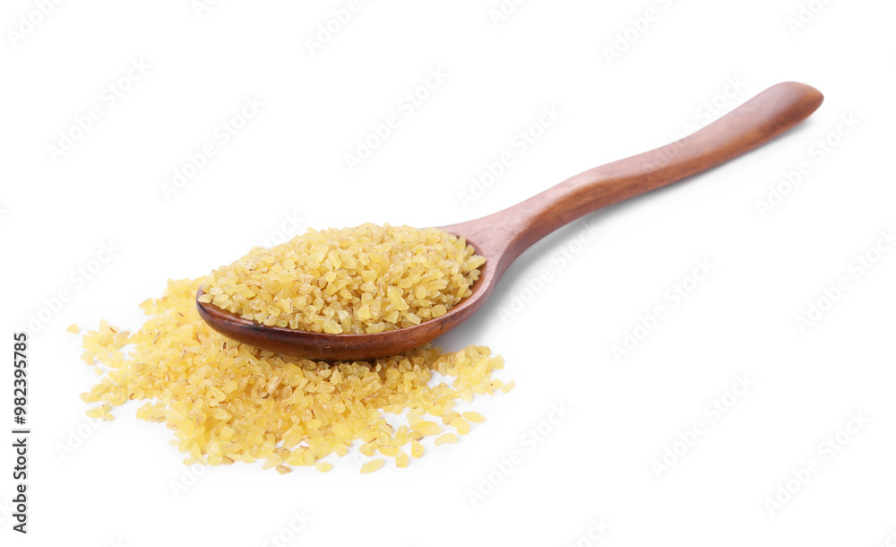 Raw bulgur in wooden spoon isolated on white Raw bulgur in wooden spoon isolated on white
