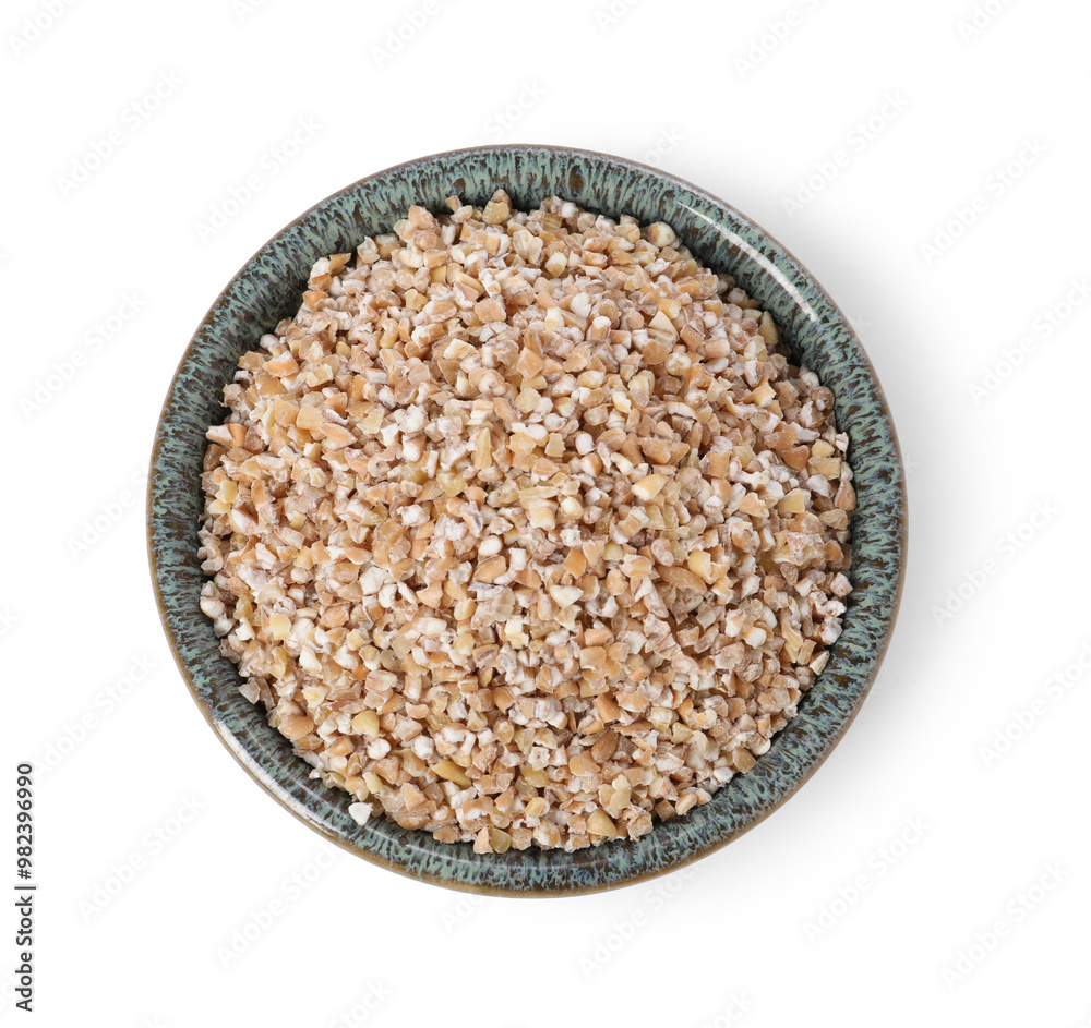 Dry wheat groats in bowl isolated on white, top view Dry wheat groats in bowl isolated on white, top view