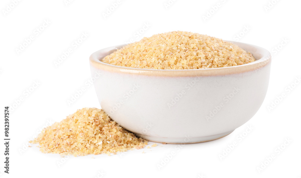 Raw wheat groats in bowl isolated on white Raw wheat groats in bowl isolated on white