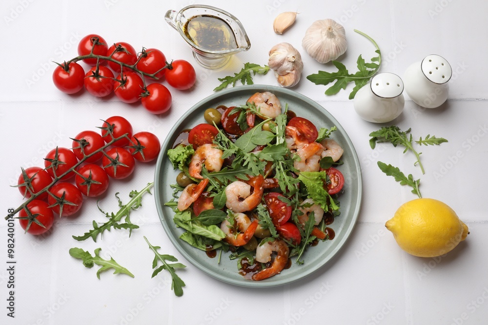 Delicious shrimp salad with ingredients on white tiled table, flat lay Delicious shrimp salad with ingredients on white tiled table, flat lay