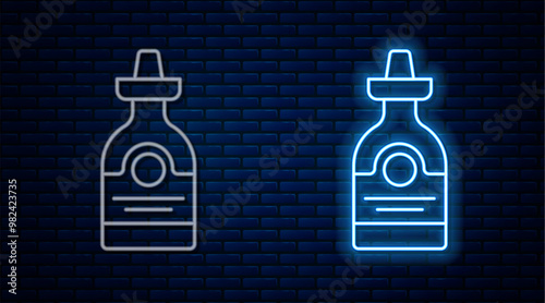 Glowing neon line Tequila bottle icon isolated on brick wall background. Mexican alcohol drink. Vector