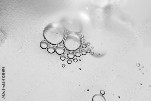 The surface of the cosmetic product has bubbles. blurred background. soft focus