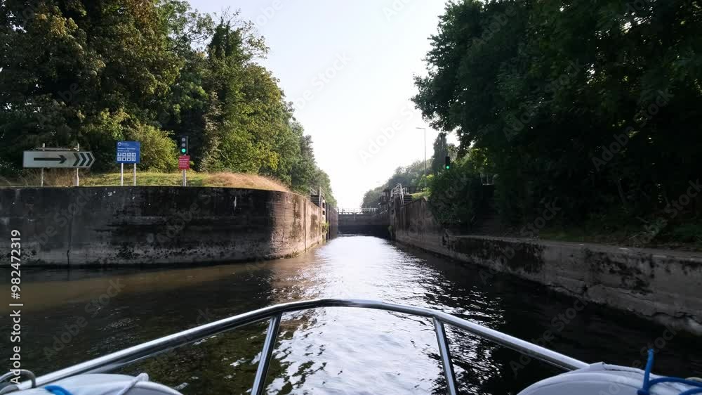 POV video off the front of a Riverboat as to gets close to a lock on the River Trent. POV video off the front of a Riverboat as to gets close to a lock on the River Trent.