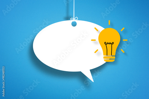 Lightbulb and blank speech bubble on blue background