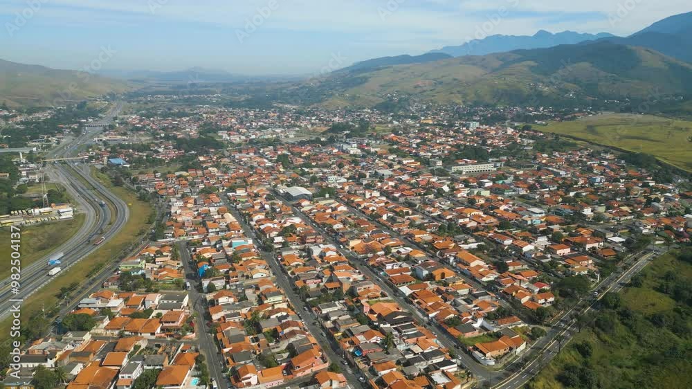 Small town in Brazil, flight over a small town in Brazil, natural light, drone flight. Itatiaia Town
