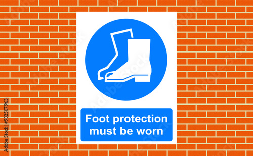 Foot protection must be worn sign on a wall