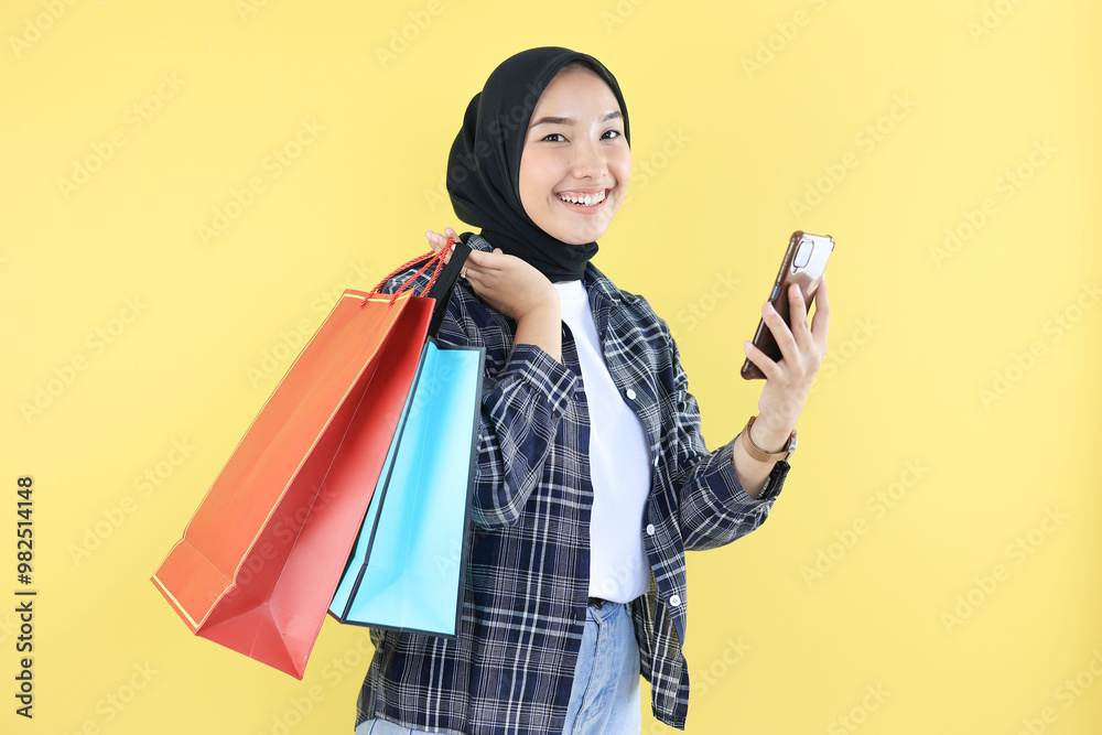 Asian Indonesian Young Woman Happy Face after Online Shopping Asian Indonesian Young Woman Happy Face after Online Shopping
