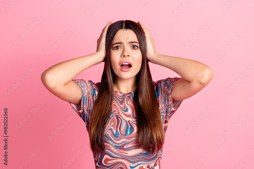 Photo of shocked impressed lady dressed print clothes hands arms head open mouth isolated pink color background Photo of shocked impressed lady dressed print clothes hands arms head open mouth isolated pink color background