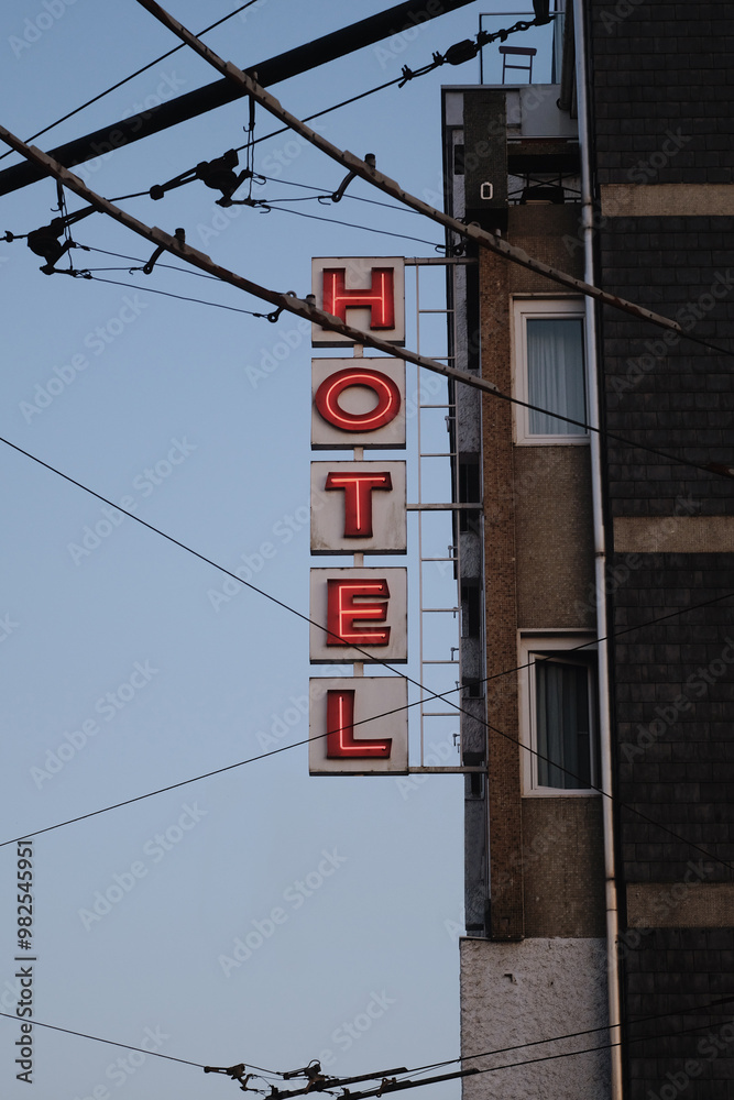 Fototapeta premium Hotel electric sign at evening in Portugal