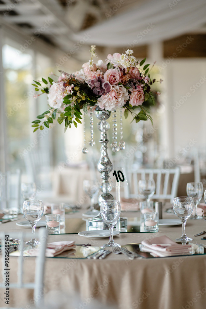 Elegant Outdoor Wedding Table Setting with Blue and White Decor Overlooking City