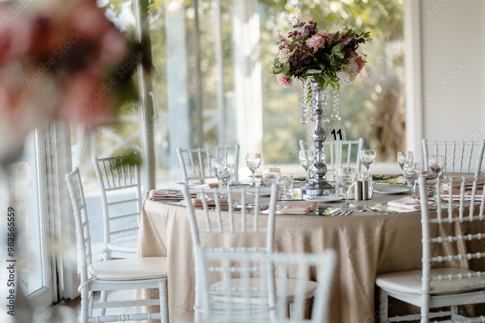 Elegant Outdoor Wedding Table Setting with Blue and White Decor Overlooking City