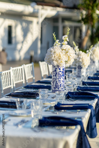 Elegant Outdoor Wedding Reception Table with Blue and White Theme