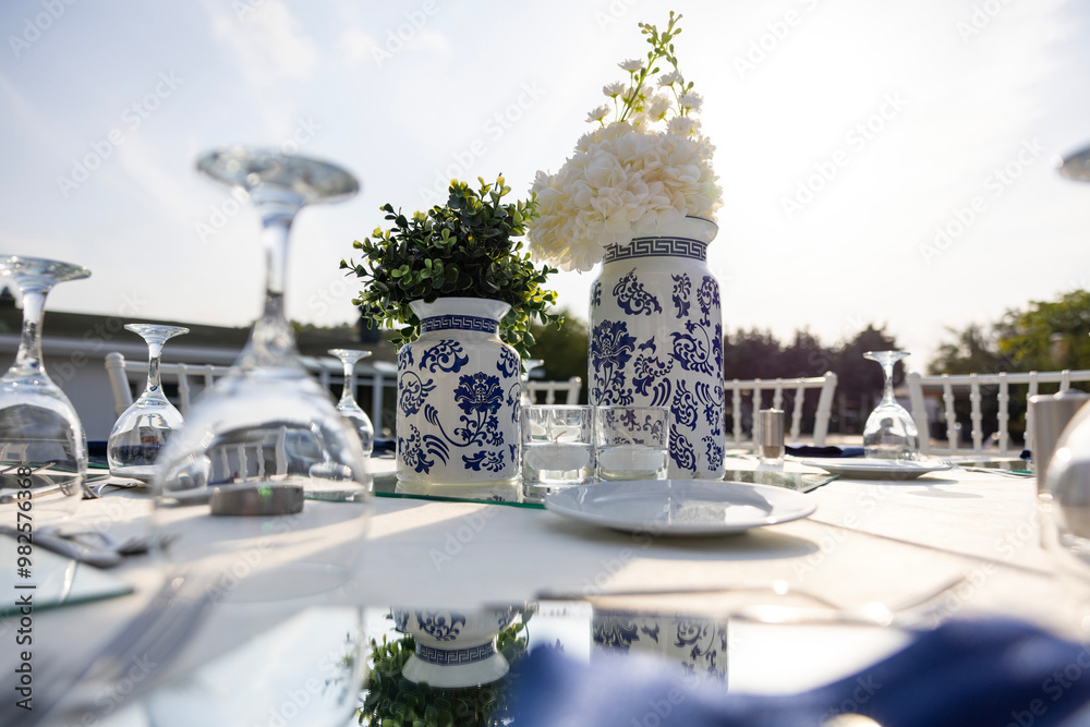 Beautiful Wedding Venue: Outdoor Stage Decorated with Pink Flowers and Cityscape
