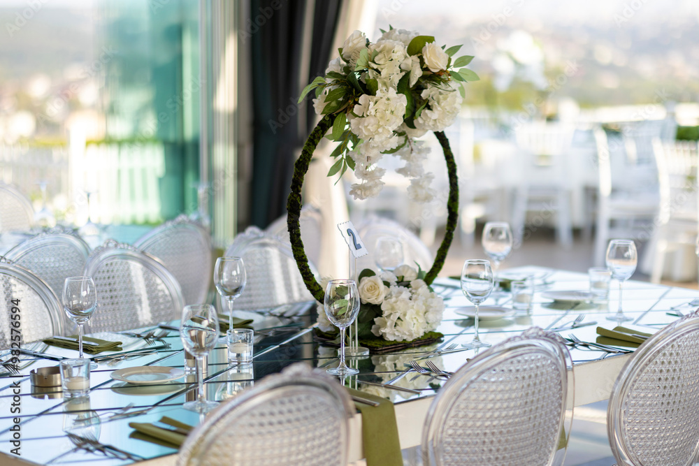 Elegant Outdoor Wedding Stage with Pink and White Floral Decor Overlooking City