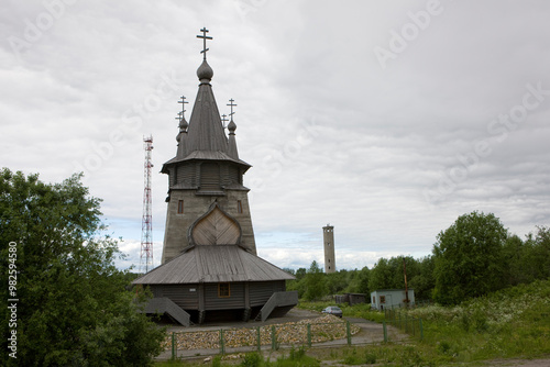 Russia Karelia Povenets Church of St. Nicholas the Wonderworker on a cloudy summer day photo