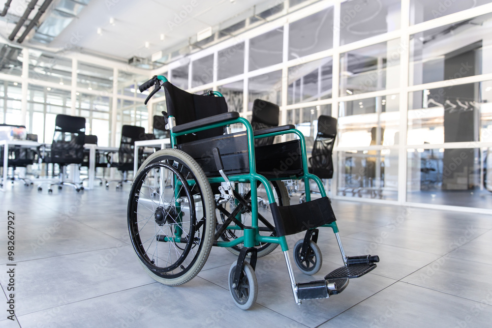 Obraz premium Modern office interior with empty wheelchair