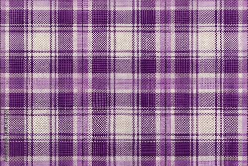 Close-up of purple and white plaid fabric texture photo