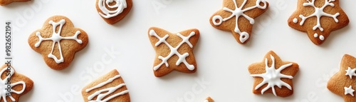 Delicious gingerbread cookies shaped as festive stars, decorated with white icing, perfect for holiday celebrations and gatherings.