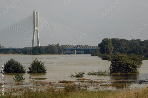 Wroclaw, Poland at the time of flooding on the Odra River Concept of urban landscapes, hydropower and urban development along the riverbank. photo