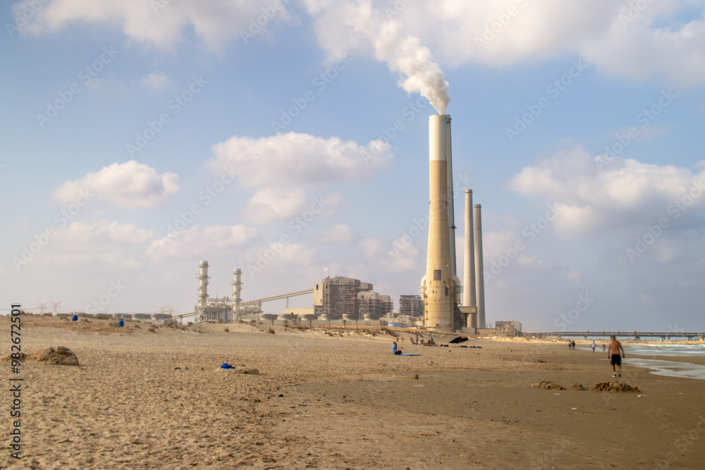 Air pollution from a power station, global warming, beach pollution Air pollution from a power station, global warming, beach pollution