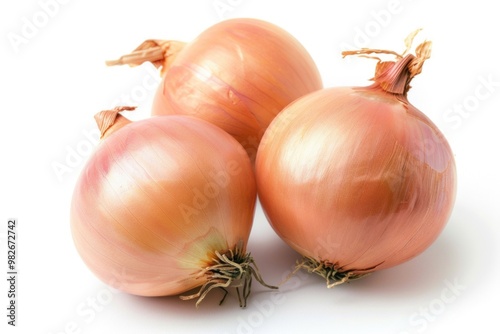 Wallpaper Mural Three onions sit on a white surface Torontodigital.ca