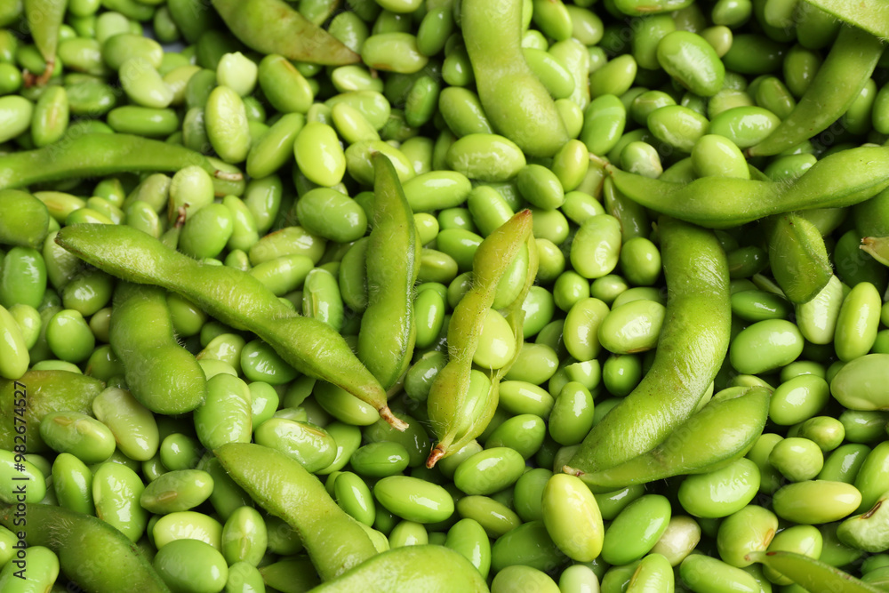 Fresh edamame beans and pods as background, above view Fresh edamame beans and pods as background, above view