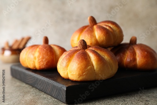 Wallpaper Mural Tasty pumpkin shaped buns on grey table, closeup Torontodigital.ca