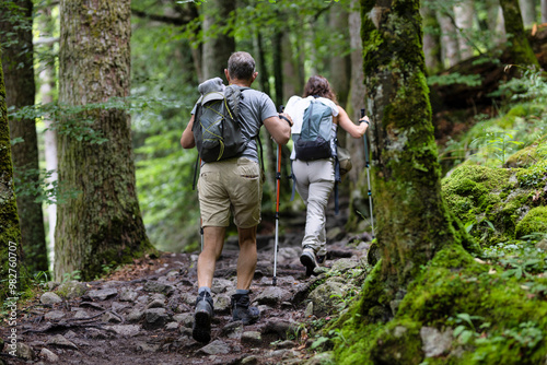 COUPLE HIKING IN THE FOREST