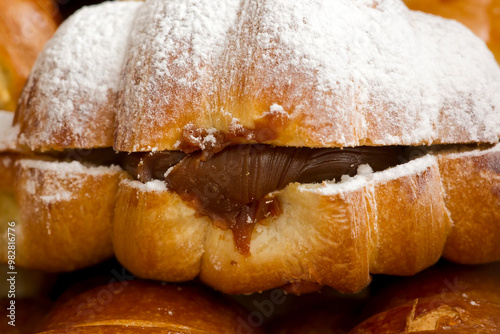 Sweet and savory bakery products with ingredients such as: coconut, flour, cherry, puff pastry, cheese, chocolate, dulce de leche, icing sugar, pastry cream.