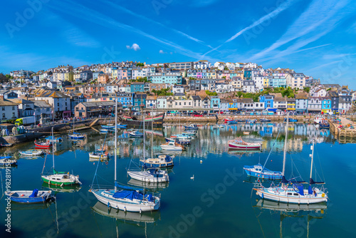 Konstfotografi Brixham Devon beautiful harbour with boats with blue sky England UK