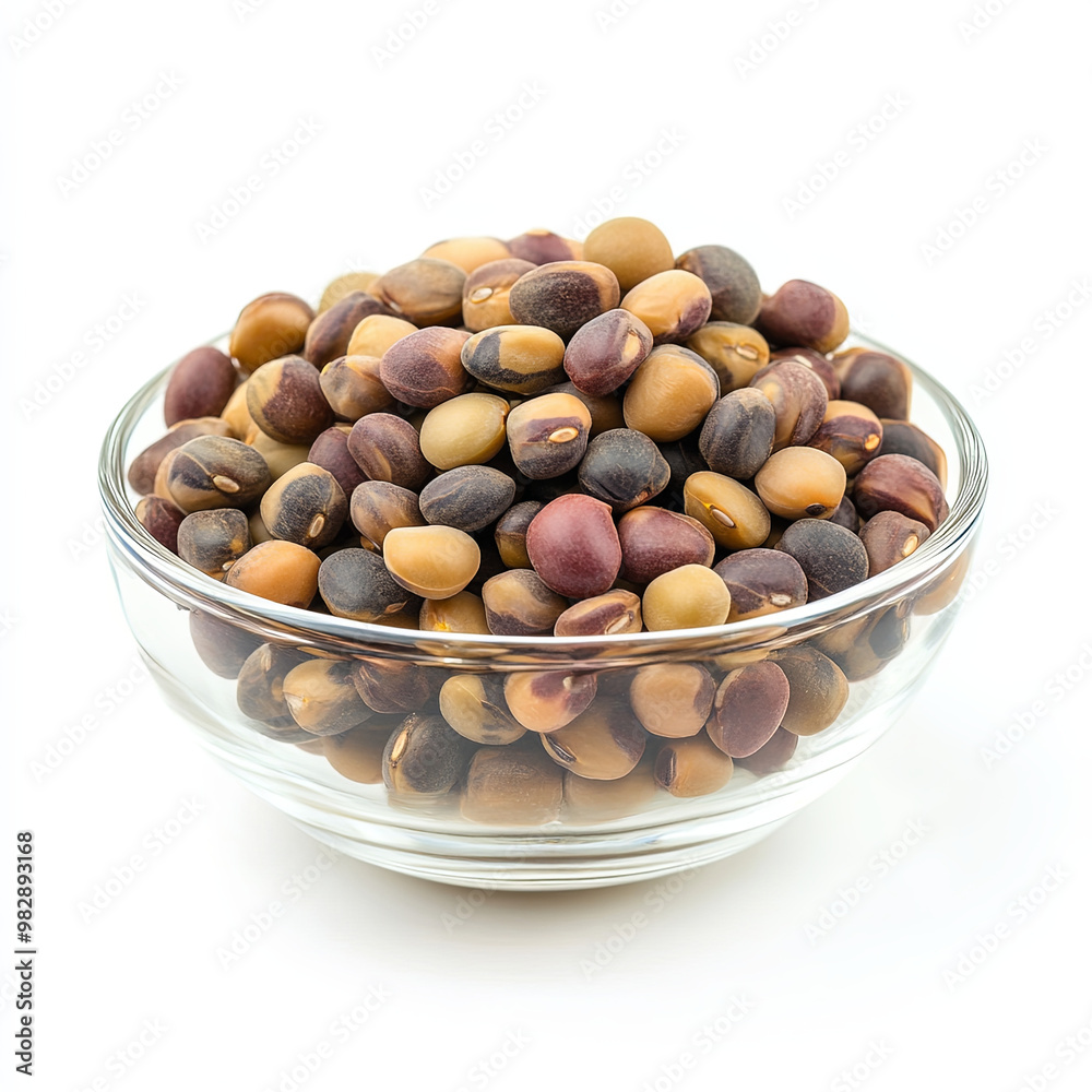 Fresh, colorful beans in clear glass bowl showcase variety of hues and textures, perfect for culinary use or decorative purposes. Their vibrant appearance adds lively touch to any kitchen Fresh, colorful beans in clear glass bowl showcase variety of hues and textures, perfect for culinary use or decorative purposes. Their vibrant appearance adds lively touch to any kitchen