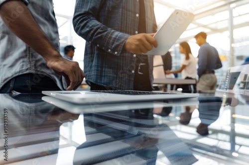 Modern business people are working using laptop and digital tablet while standing on a transparent background