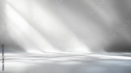 A serene abstract background featuring soft light effects and a smooth reflective surface, ideal for presentations and design work.