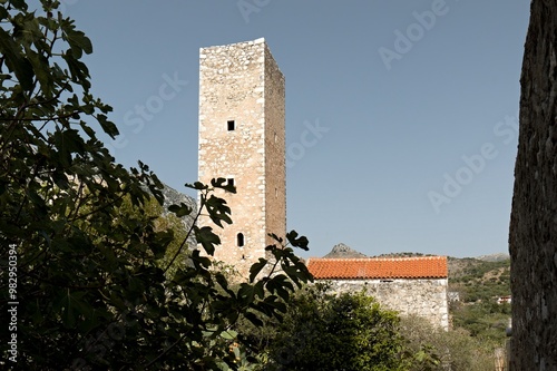 Stone houses and defensive towers of Mani in Flomochori village. Mani Peninsula, Laconia, Peloponnese, Greece. photo